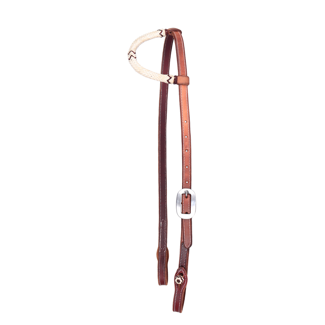 One ear rawhide braided headstall with stainless buckle and rawhide button quick change ends.